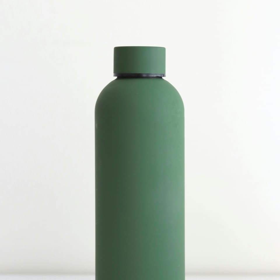 A green insulated bottle