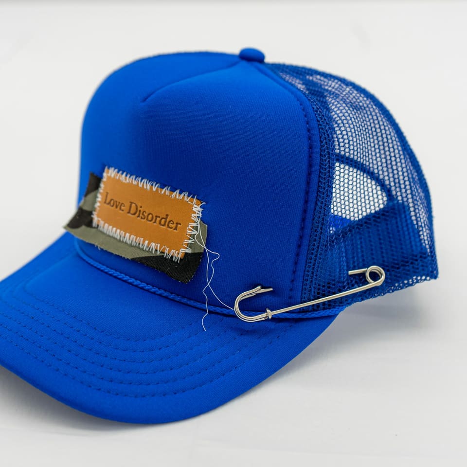 A blue trucker cap