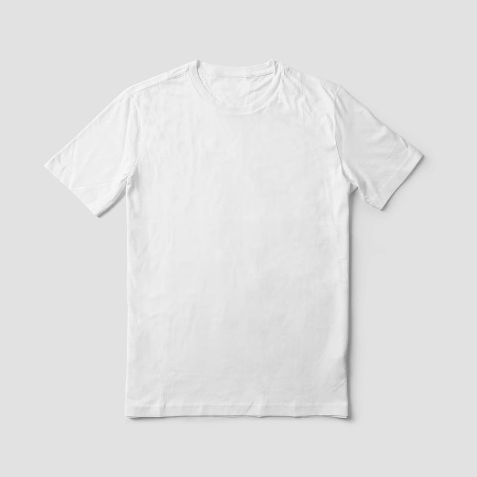 A plain white T-shirt laid flat