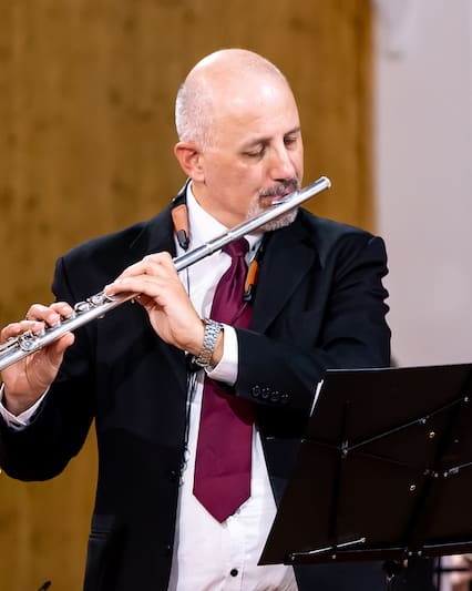 José Manuel Gil Muñoz playing the flute